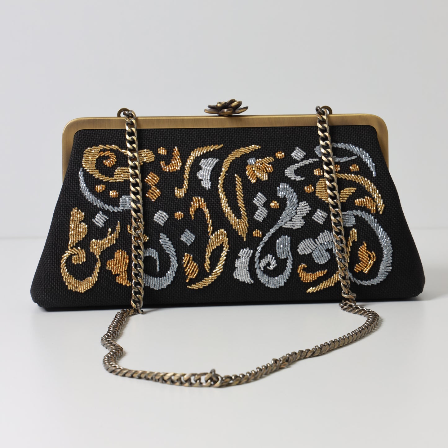 CALLIGRAPHY FLORAL CLUTCH