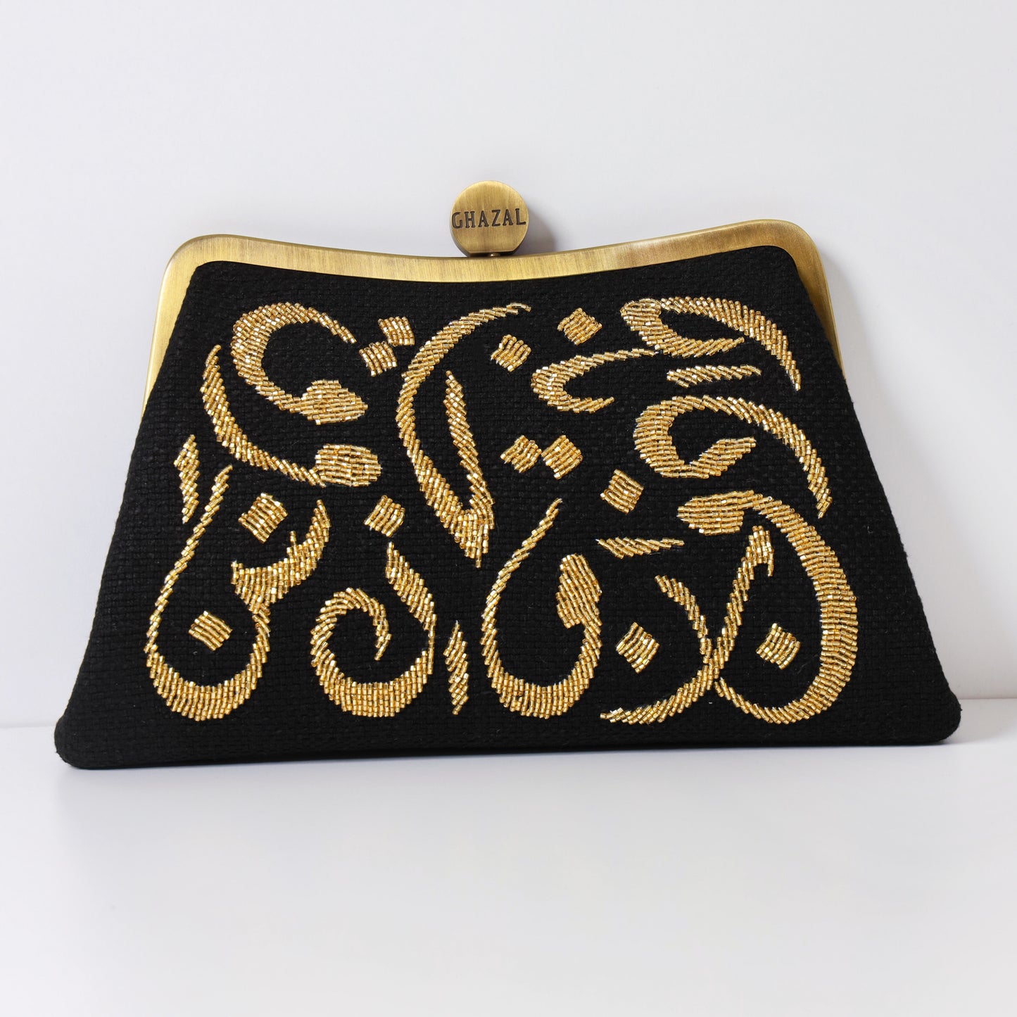 CALLIGRAPHY BRONZE CLUTCH - CALLIGRAPHY BRONZE CLUTCH custom embroidered bag and Middle Eastern luxury clutch by Ghazal by Najwa - Designer bags Lebanon, Women handmade clutch bag, personalized bags with name, Beirut clutch, Clutch Lebanon, Personalized bags Lebanon, Handmade clutch bags, Iraq clutch calligraphy, Palestine clutch