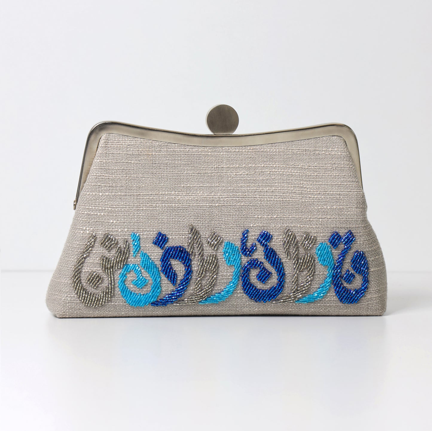 THE HORIZONTAL CALLIGRAPHY CLUTCH