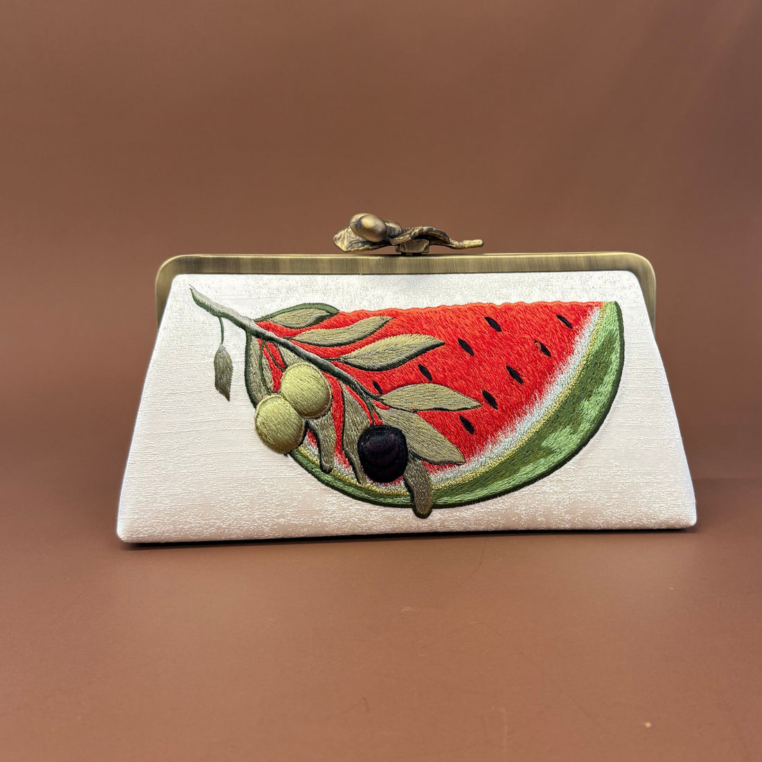 Introducing Our Watermelon-Inspired Bag Design - Introducing Our Watermelon-Inspired Bag Design journal image about Arabic calligraphy bags, luxury clutch gifts, and handmade bags Lebanon - Designer bags Lebanon, Women handmade clutch bag, personalized bags with name, Beirut clutch, Clutch Lebanon, Personalized bags Lebanon, Handmade clutch bags, Iraq clutch calligraphy, Palestine clutch