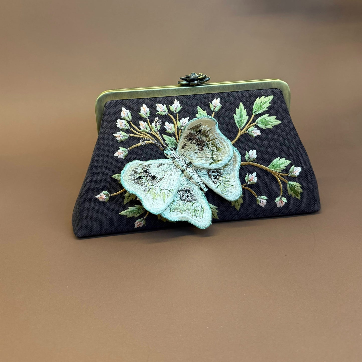 BUTTERFLY CLUTCH
