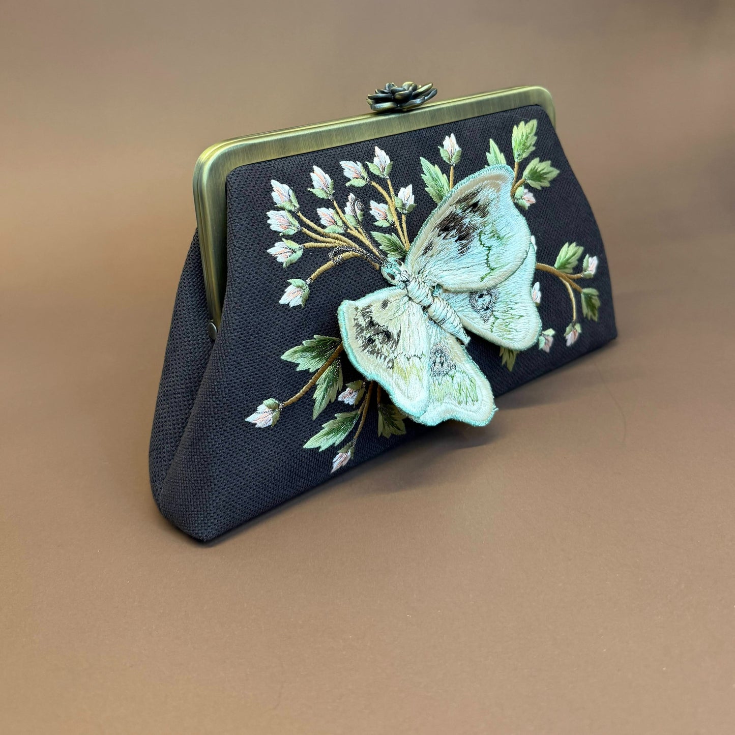 BUTTERFLY CLUTCH
