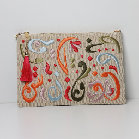 COLORED CALLIGRAPHY POUCH-handcrafted embroidered bag by Ghazal by Najwa - COLORED CALLIGRAPHY POUCH artisan embroidered clutch and beaded clutch bag handmade in Lebanon - Designer bags Lebanon, Women handmade clutch bag, personalized bags with name, Beirut clutch, Clutch Lebanon, Personalized bags Lebanon, Handmade clutch bags, Iraq clutch calligraphy, Palestine clutch