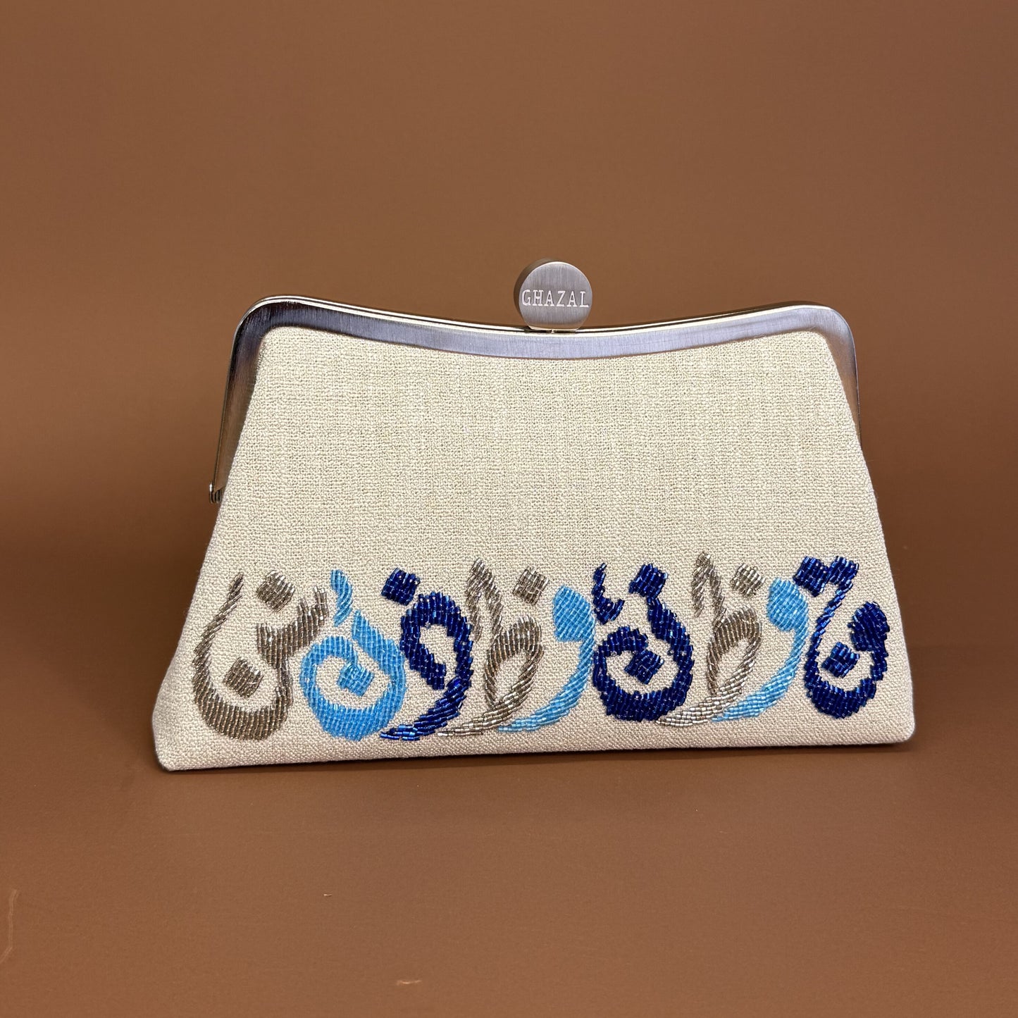 THE HORIZONTAL CALLIGRAPHY CLUTCH