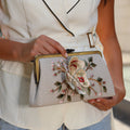 Butterfly Clutch – 3D silk-embroidered linen clutch with butterfly motif by Ghazal by Najwa