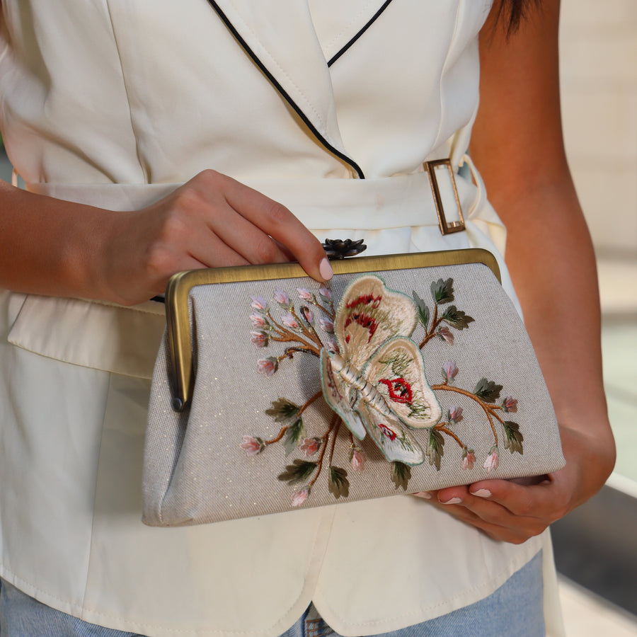 Butterfly Clutch – 3D silk-embroidered linen clutch with butterfly motif by Ghazal by Najwa
