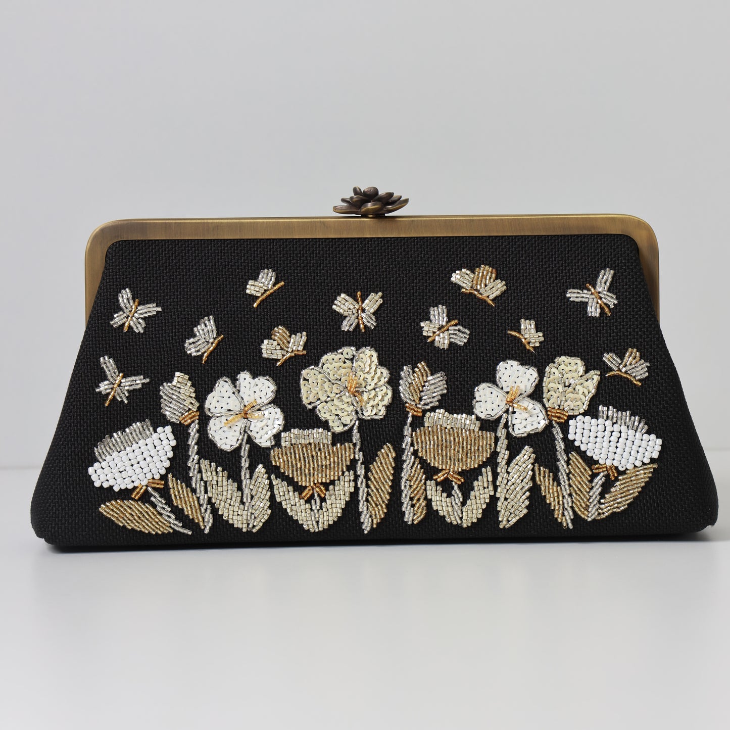THE FLOWERS AND BUTTERFLIES CLUTCH