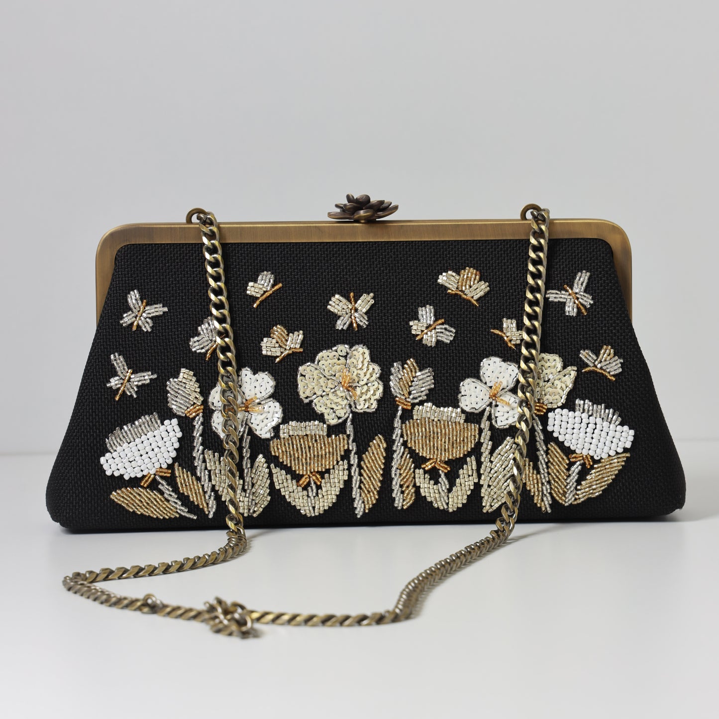 THE FLOWERS AND BUTTERFLIES CLUTCH