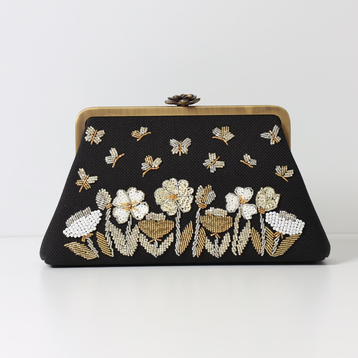 THE FLOWERS AND BUTTERFLIES CLUTCH