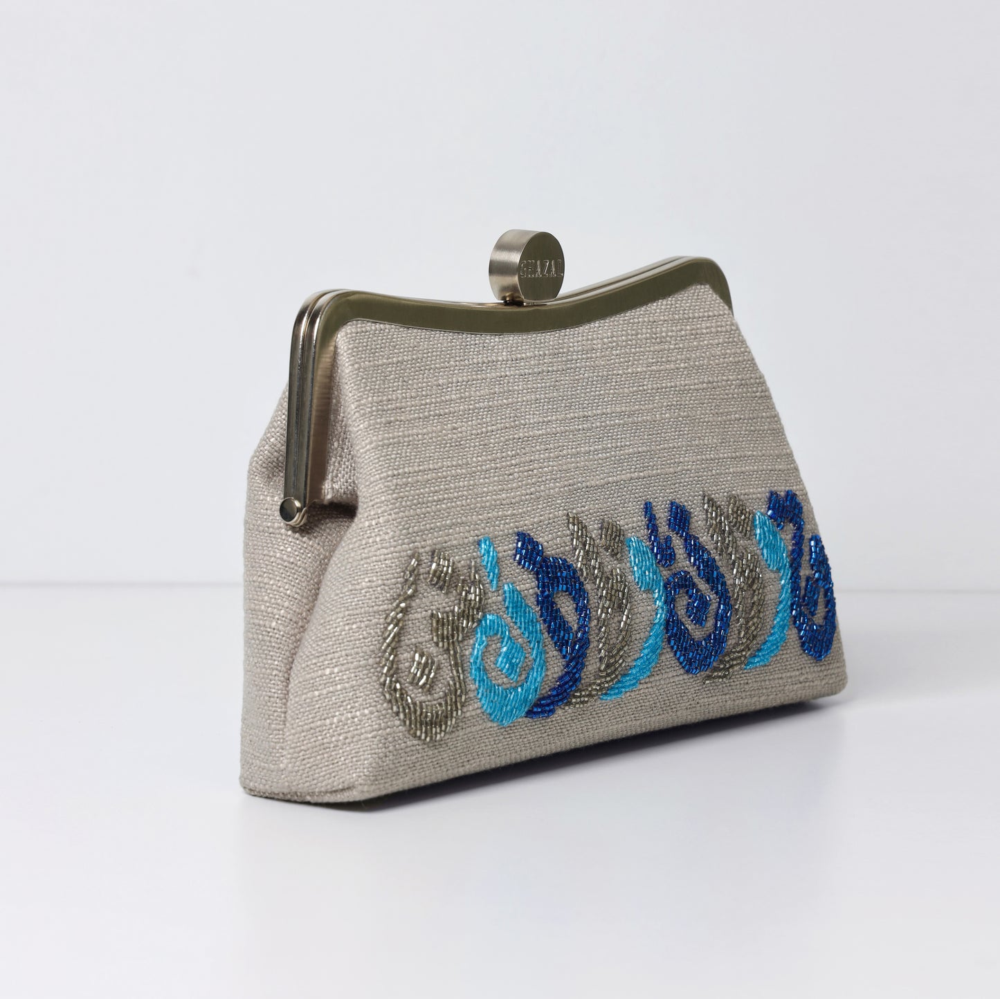 THE HORIZONTAL CALLIGRAPHY CLUTCH
