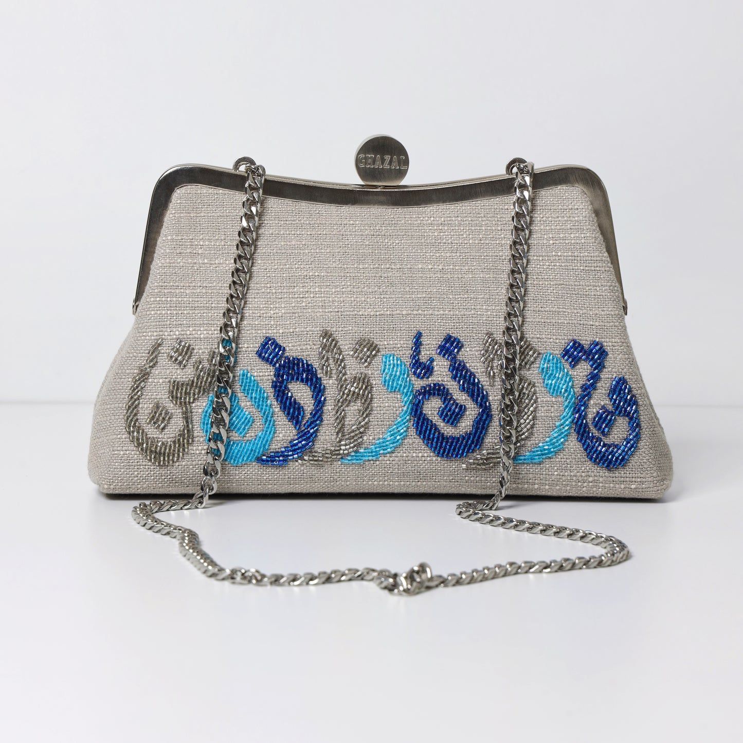 THE HORIZONTAL CALLIGRAPHY CLUTCH