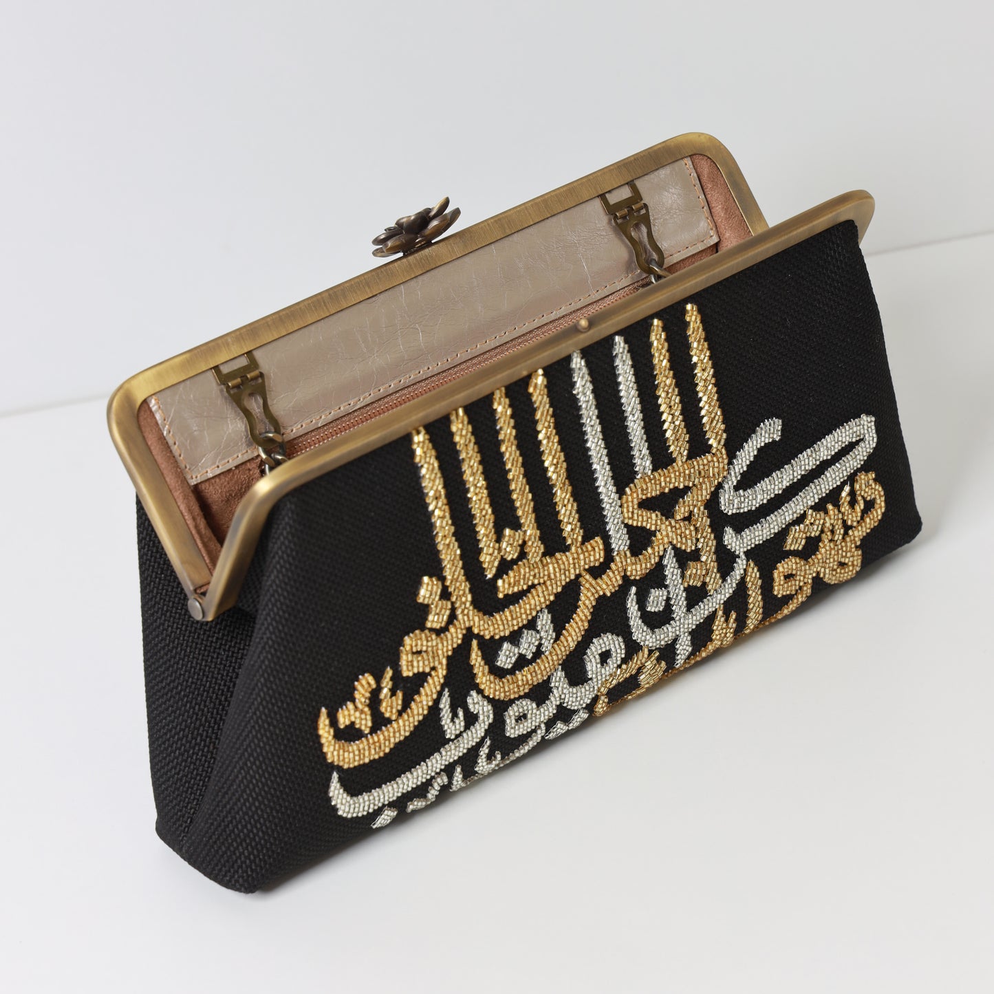 KON JAMEEL AL KHOLOQ  CLUTCH