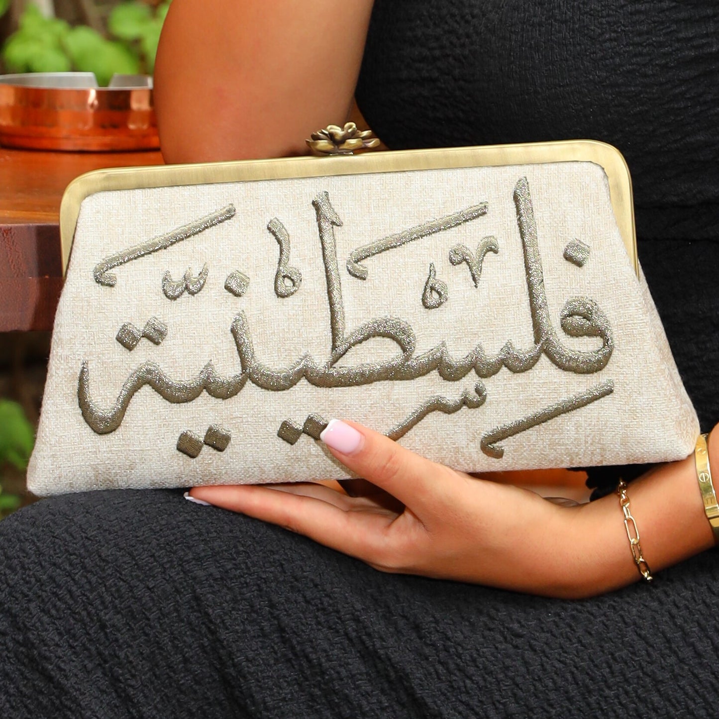 MOFTAH AL AAWDAH CLUTCH