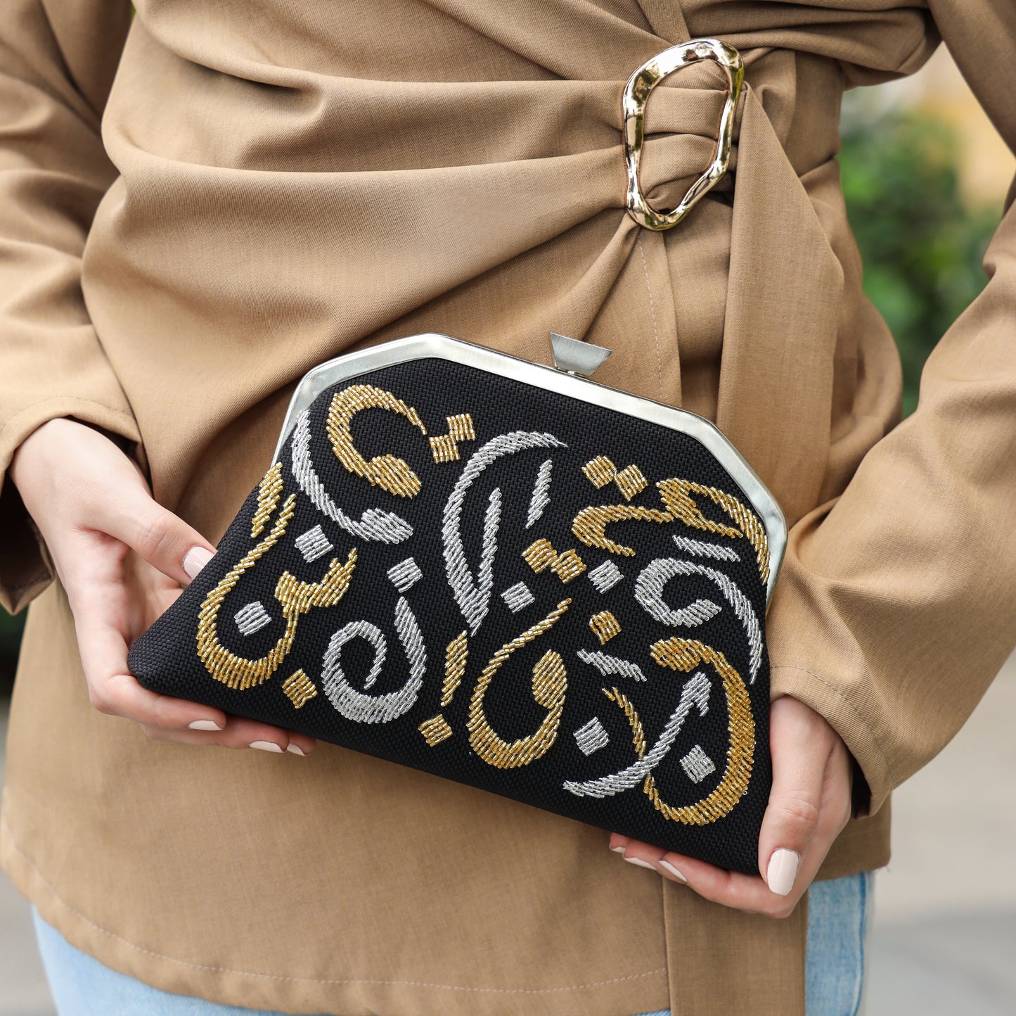 CALLIGRAPHY TRAPEZE CLUTCH