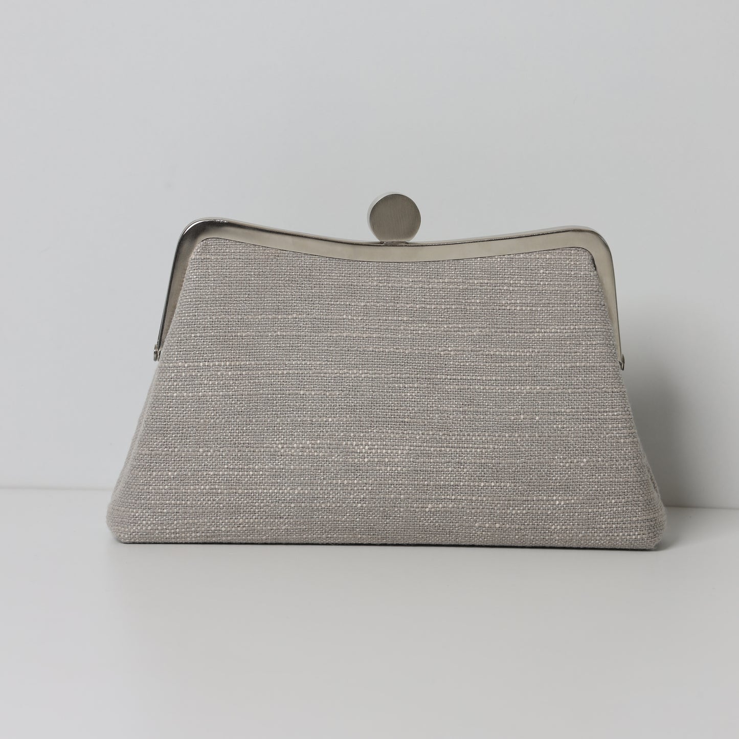 THE VERTICAL CALLIGRAPHY CLUTCH