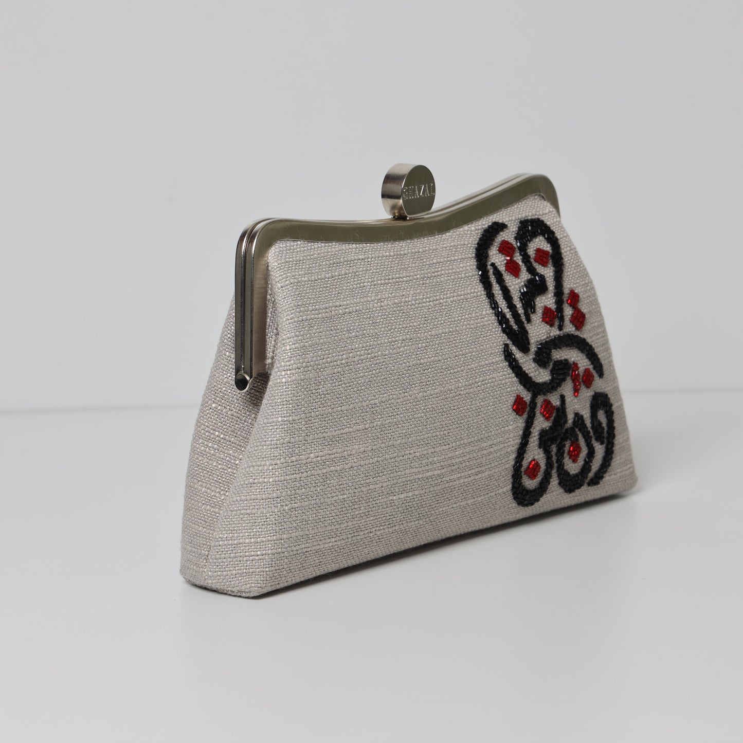 THE VERTICAL CALLIGRAPHY CLUTCH